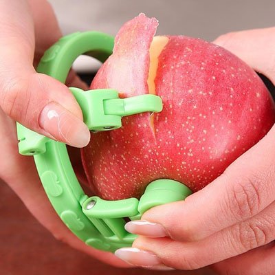 un eplucheur pomme vert 