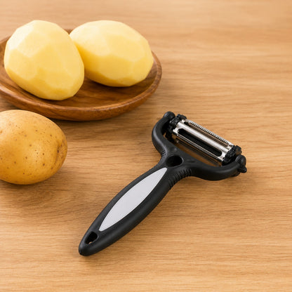 eplucheur pomme de terre sur une table 