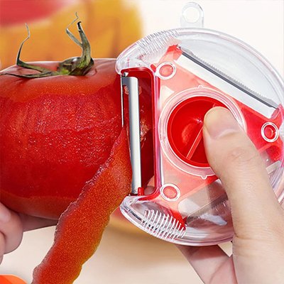 Eplucheur rouge pour éplucher les pommes 