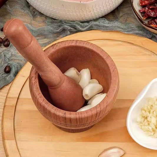 faire une purée d'ail avac un mortier pour cuisine 