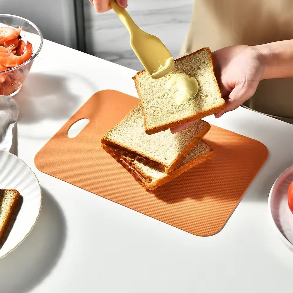 une planche a decouper orange 