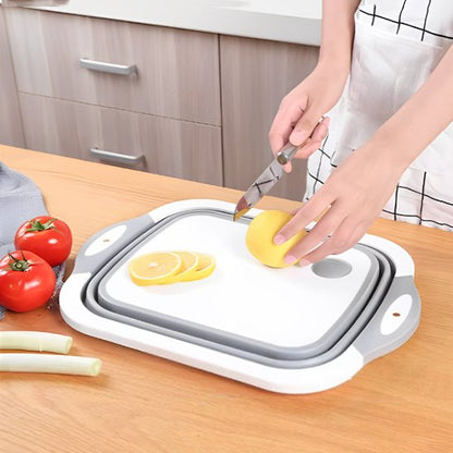 couper des citrons sur une planche a decouper blanche 