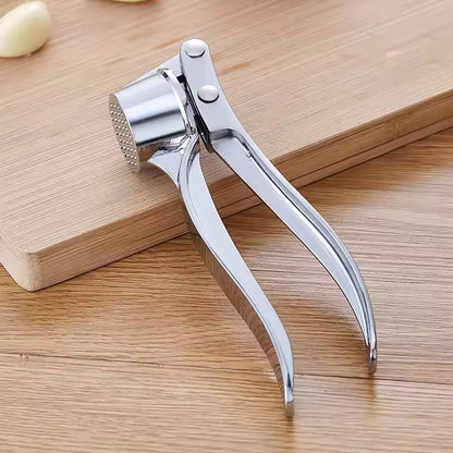 un presse ail en inox 