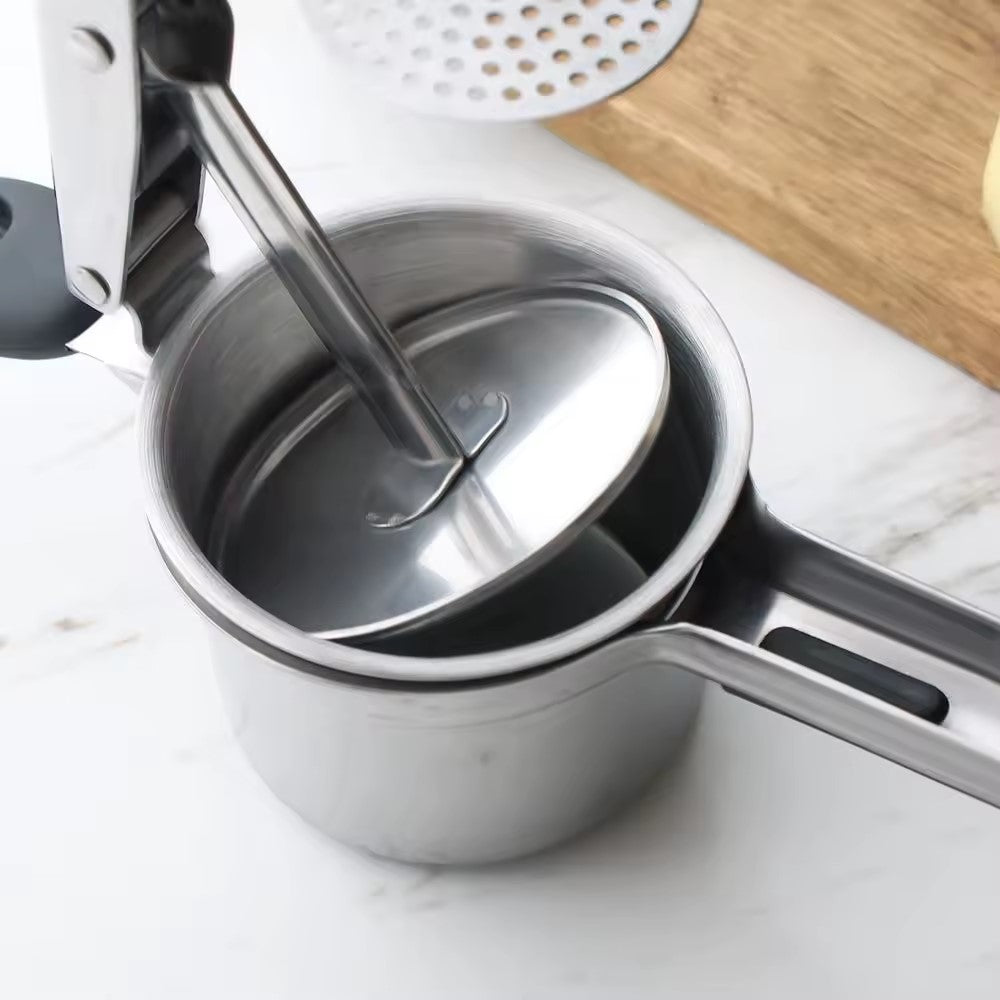 un presse purée en inox
