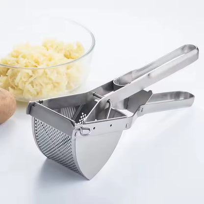 un presse purée manuel en inox