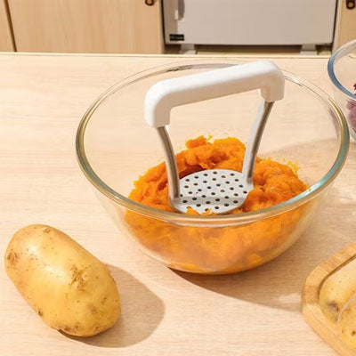 une purée patate douce faite avec un presse purée