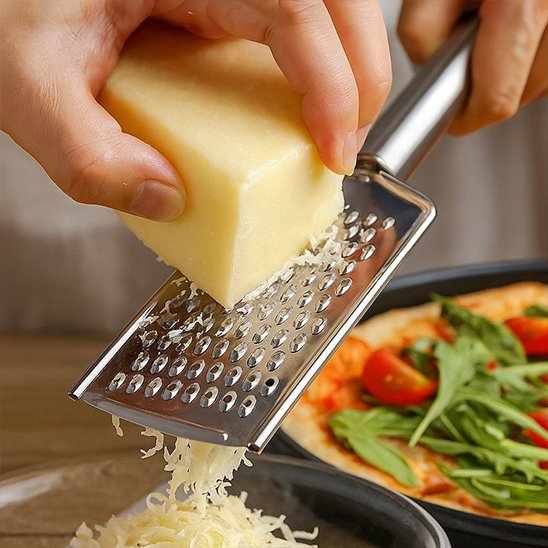 Râpe à fromage avec pogné ergonomique 