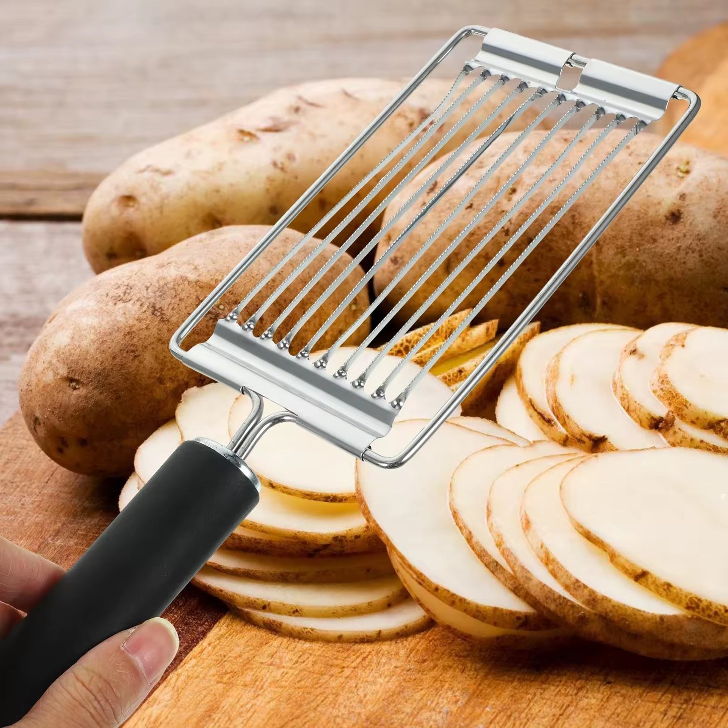 couper des pomme de terre avec une trancheuse à saucisson